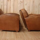 Pair of Art Deco leather club armchairs from the 1930s.