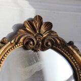 Small golden mirror in baroque style