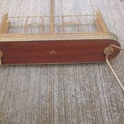 1960s brass folding magazine rack with lacquered wood decoration.