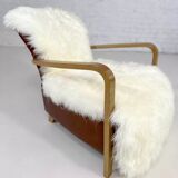 Scandinavian style armchair in leather and hide