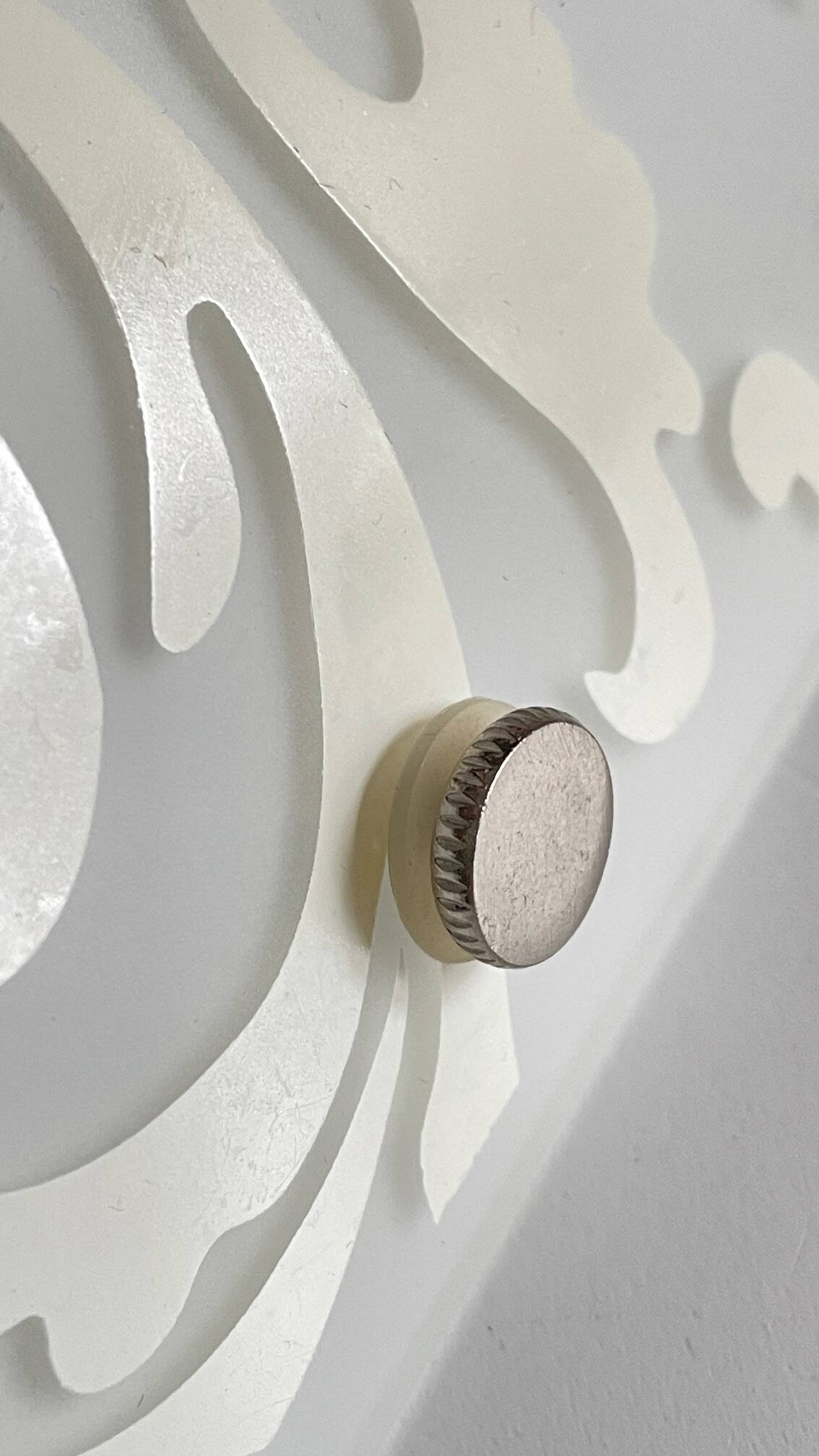 Polished and screen-printed glass sconce by eglo