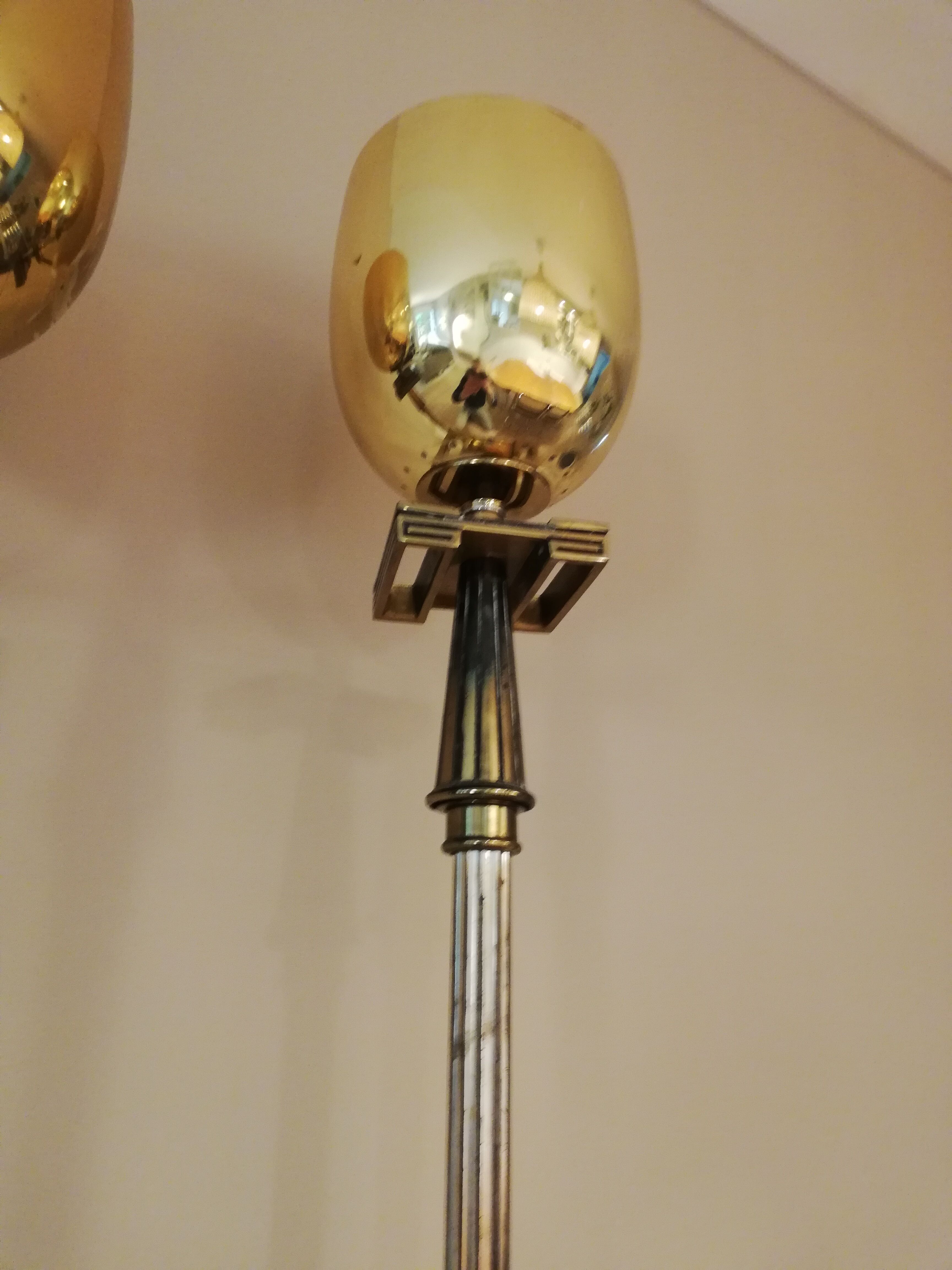 Pair of milked art deco metal lampposts