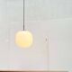 Minimalist suspended glass ball lamp from the vintage German space age by Glashütte Limburg, 1970s.