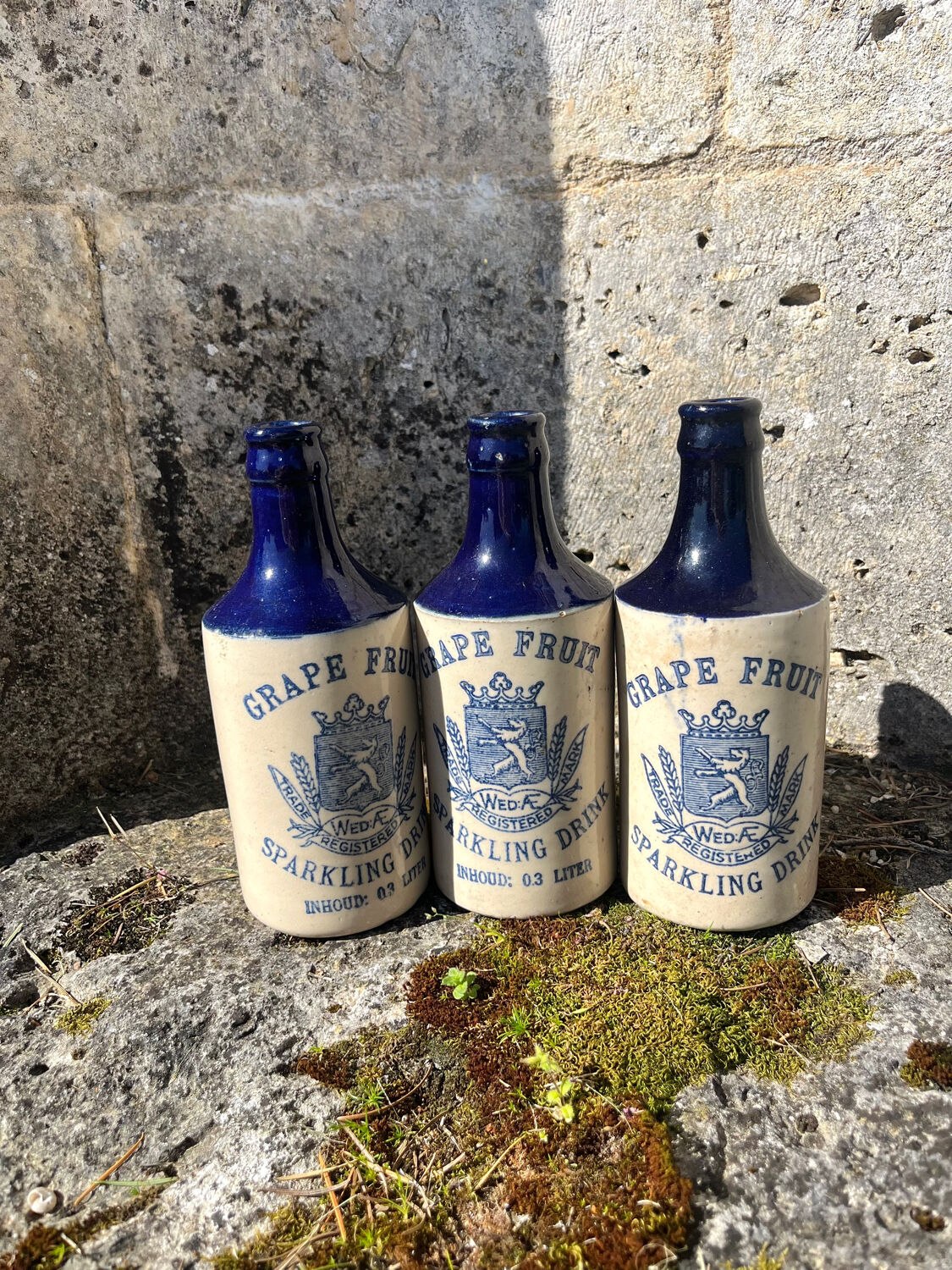 French stoneware grapefruit sparkling drink bottles