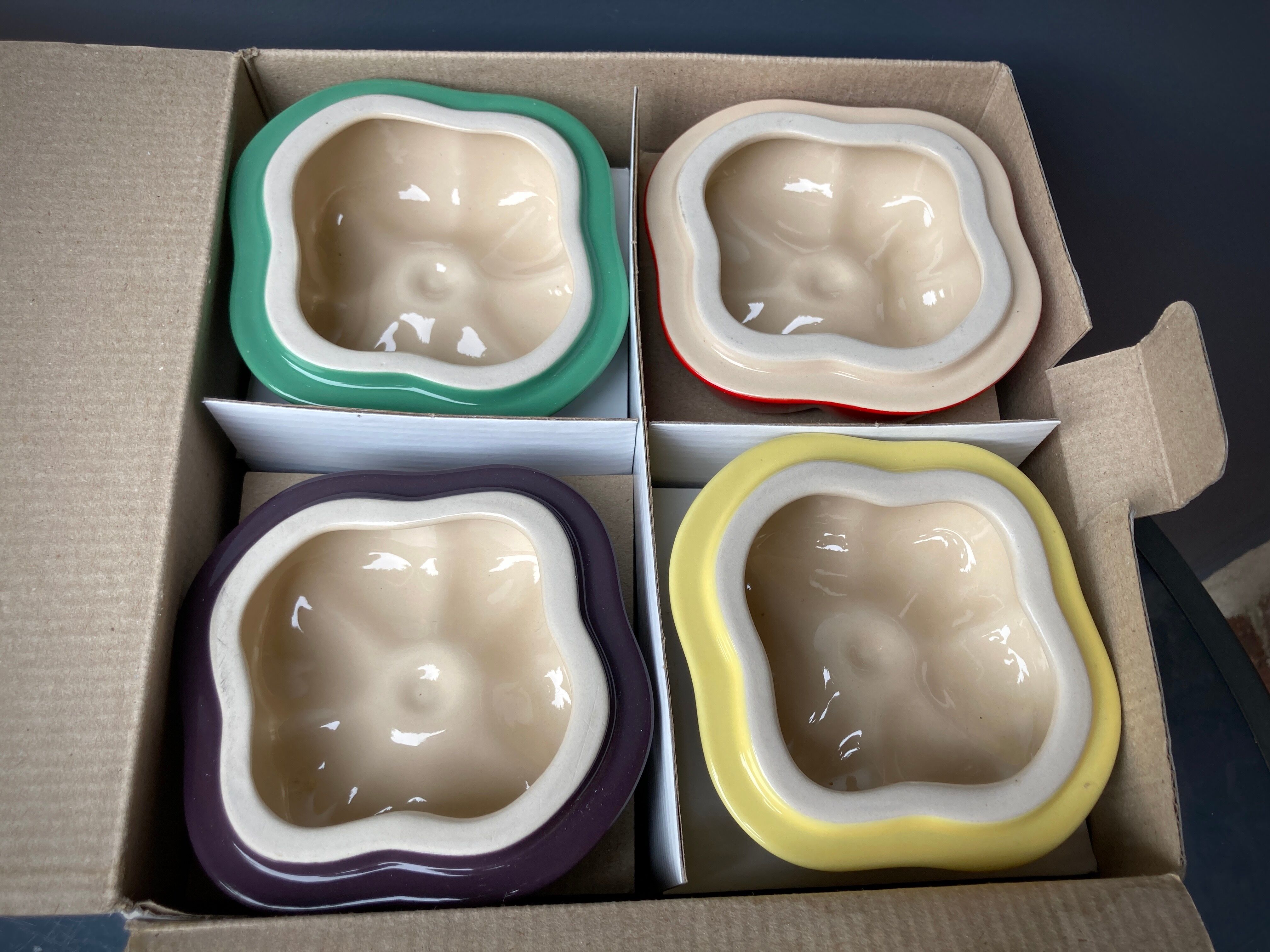 Four Le Creuset ceramic casseroles