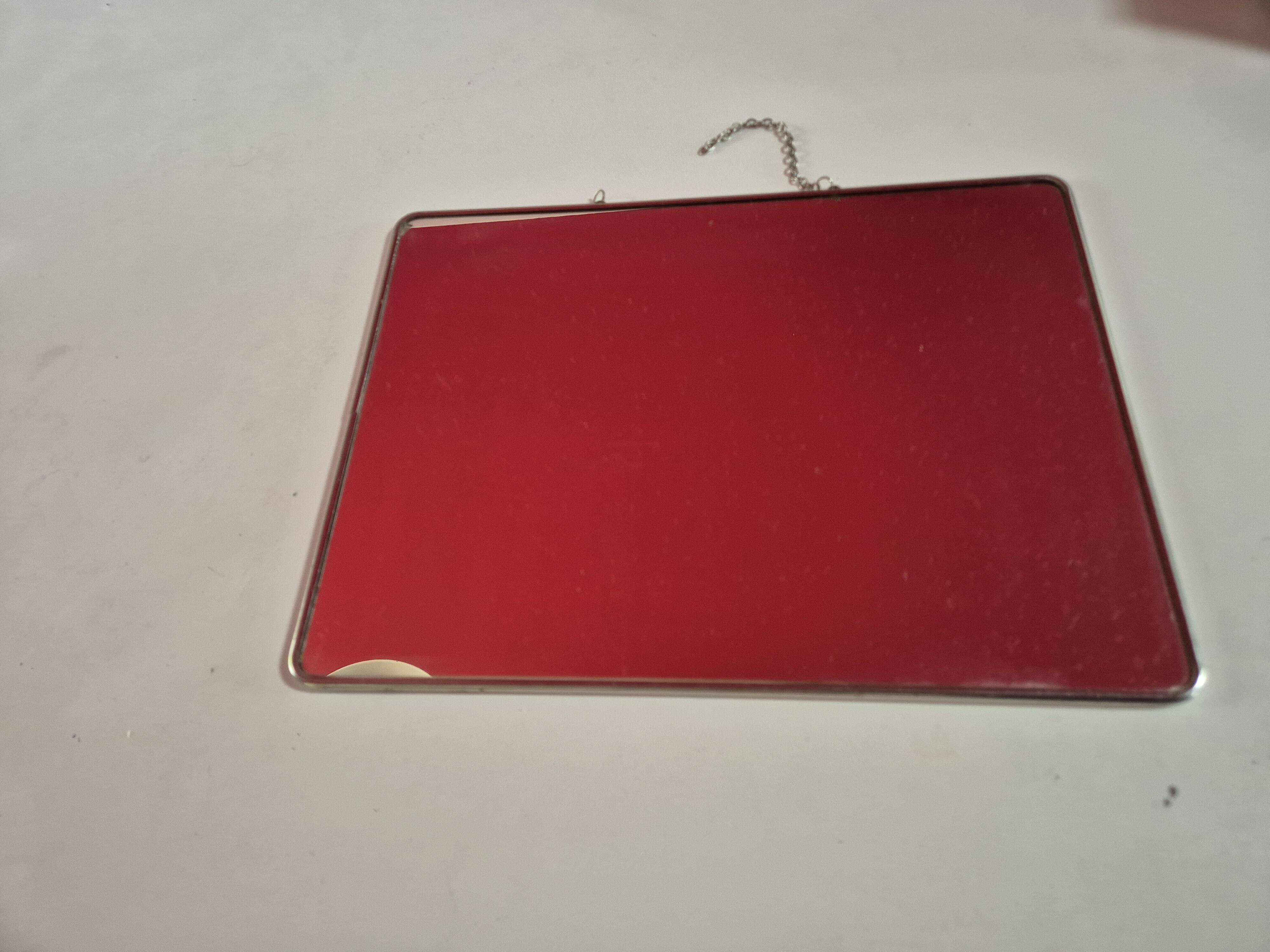 vintage rectangular mirror with broken barber-style chain