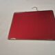 vintage rectangular mirror with broken barber-style chain