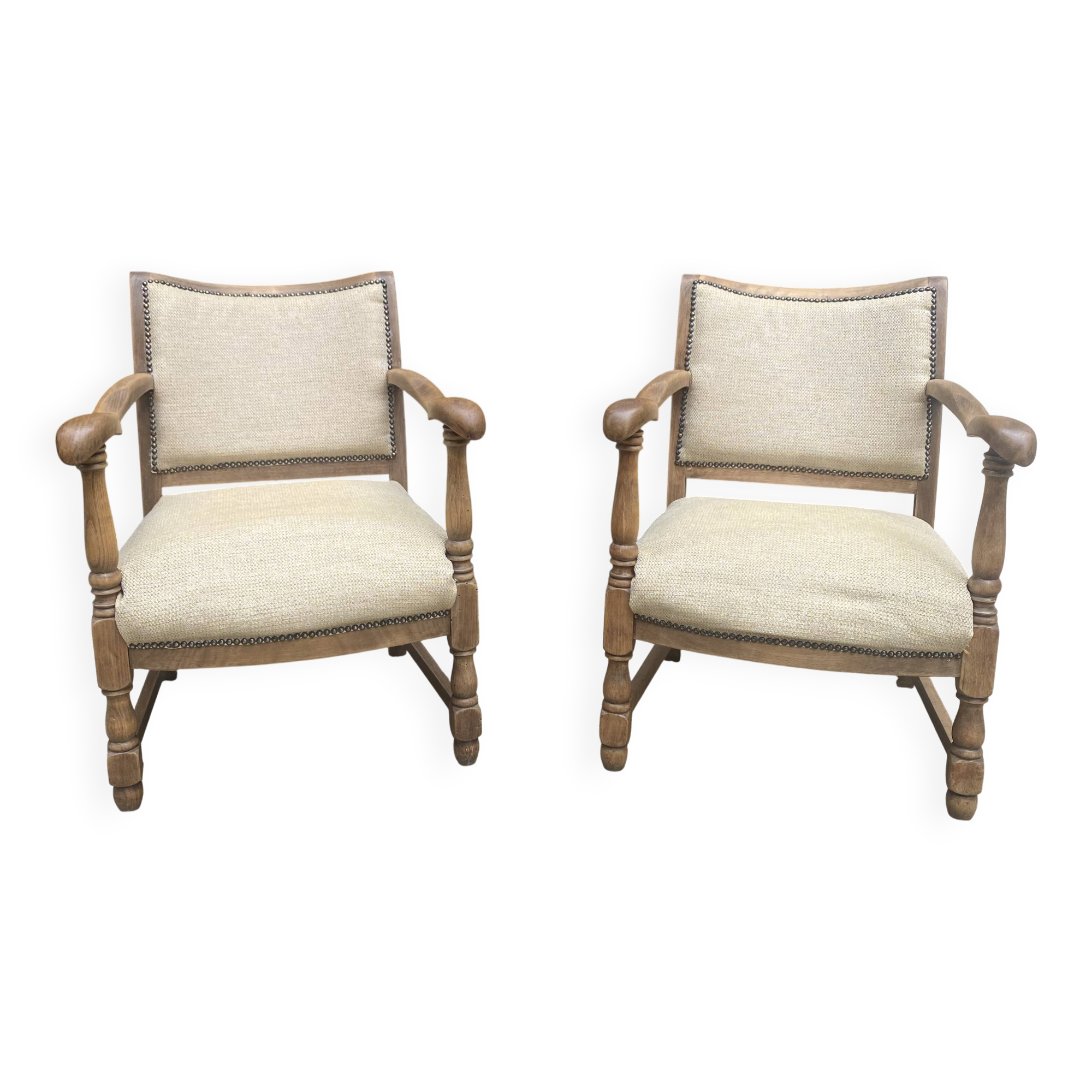 Pair of wooden and cream fabric armchairs