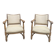 Pair of wooden and cream fabric armchairs