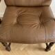 Pair of vintage 1970s armchairs in solid oak and cognac faux leather.