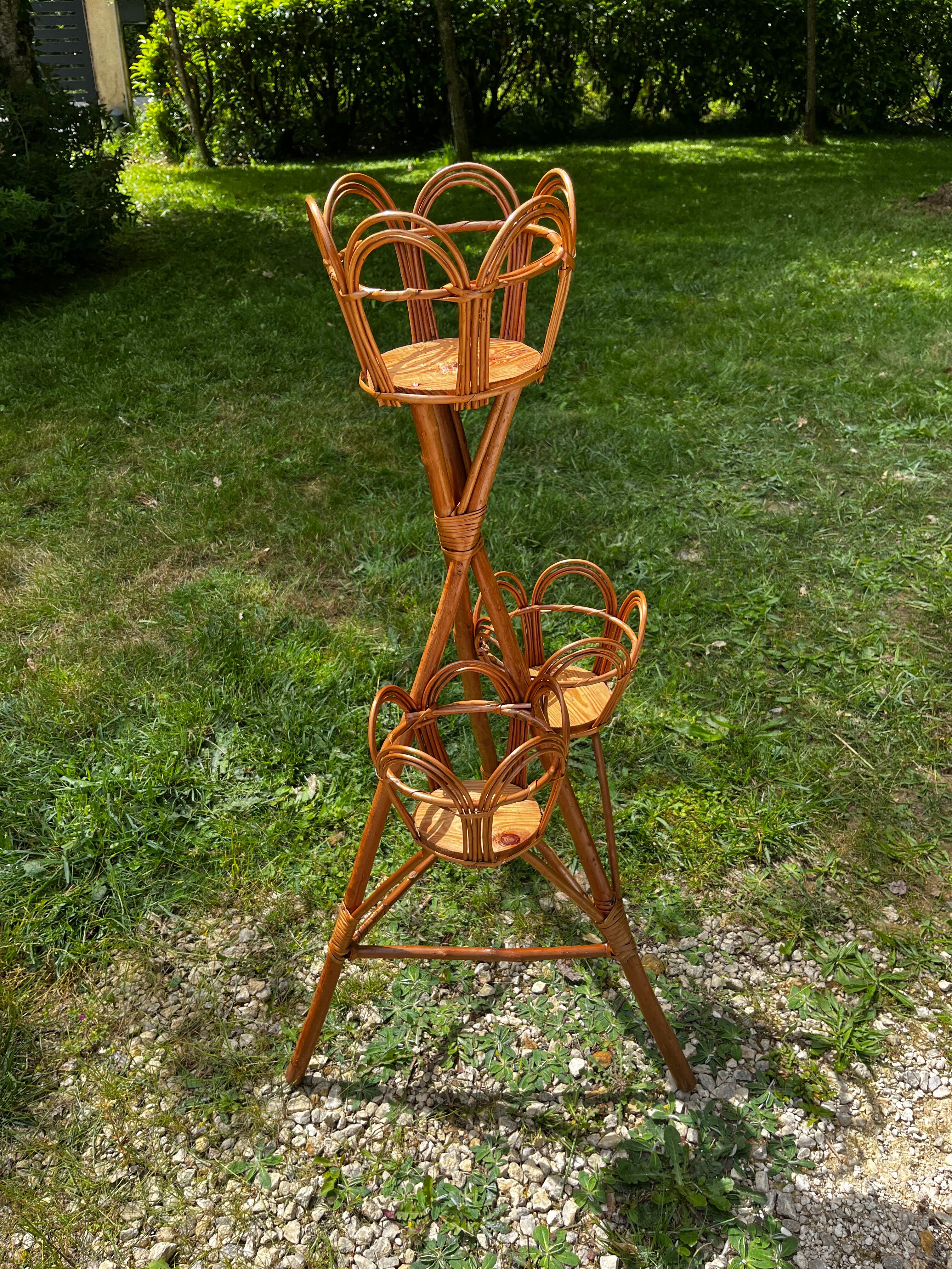 Support triptych for plants in rattan