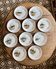 Set of 10 antique flat plates in porcelain, decorated with fish.