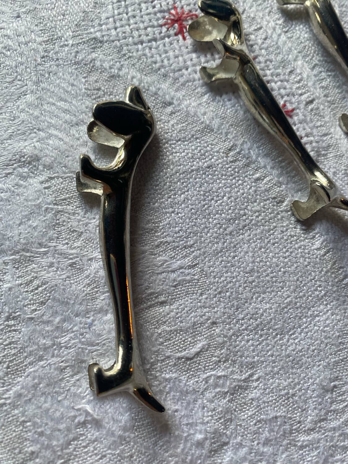 Set of 6 silver metal dachshund knife rests