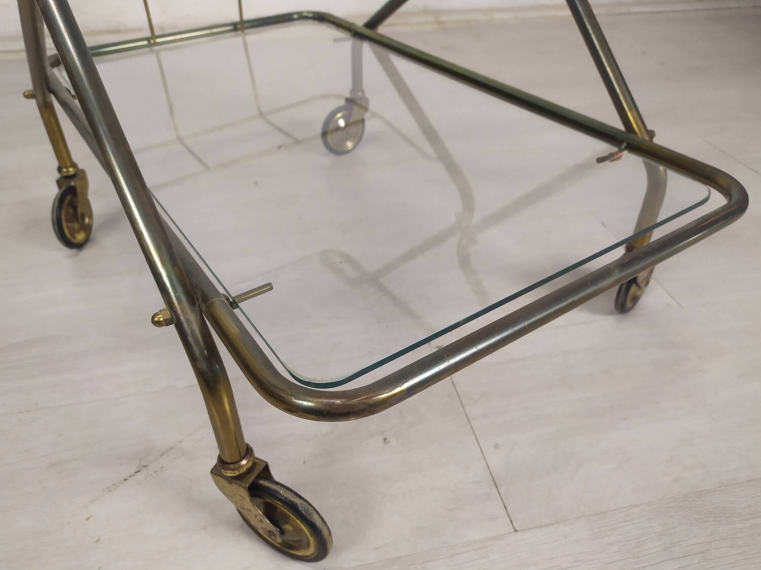 Vintage brass rolling cart