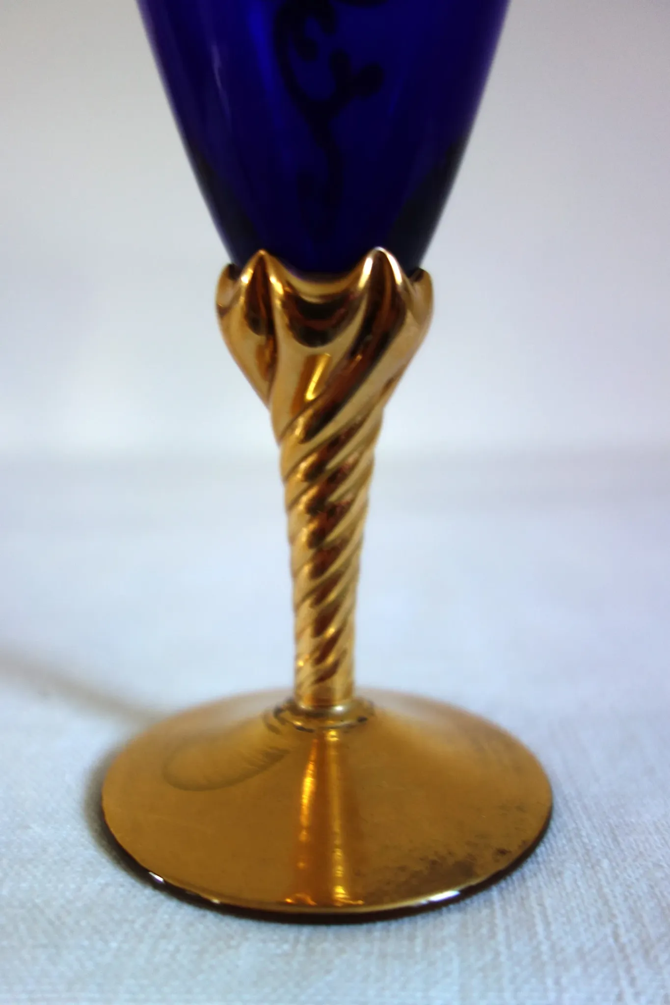 12 cobalt blue and gold Murano glass flutes, mid-20th century.