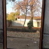 Antique mirror/black and gold frame