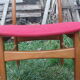 Pair of Scandinavian chairs in teak and red fabric