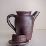 Brown ceramic artisan coffee maker
