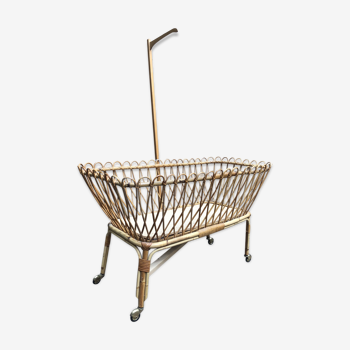 Beautiful rattan cradle with optional curtain adornment