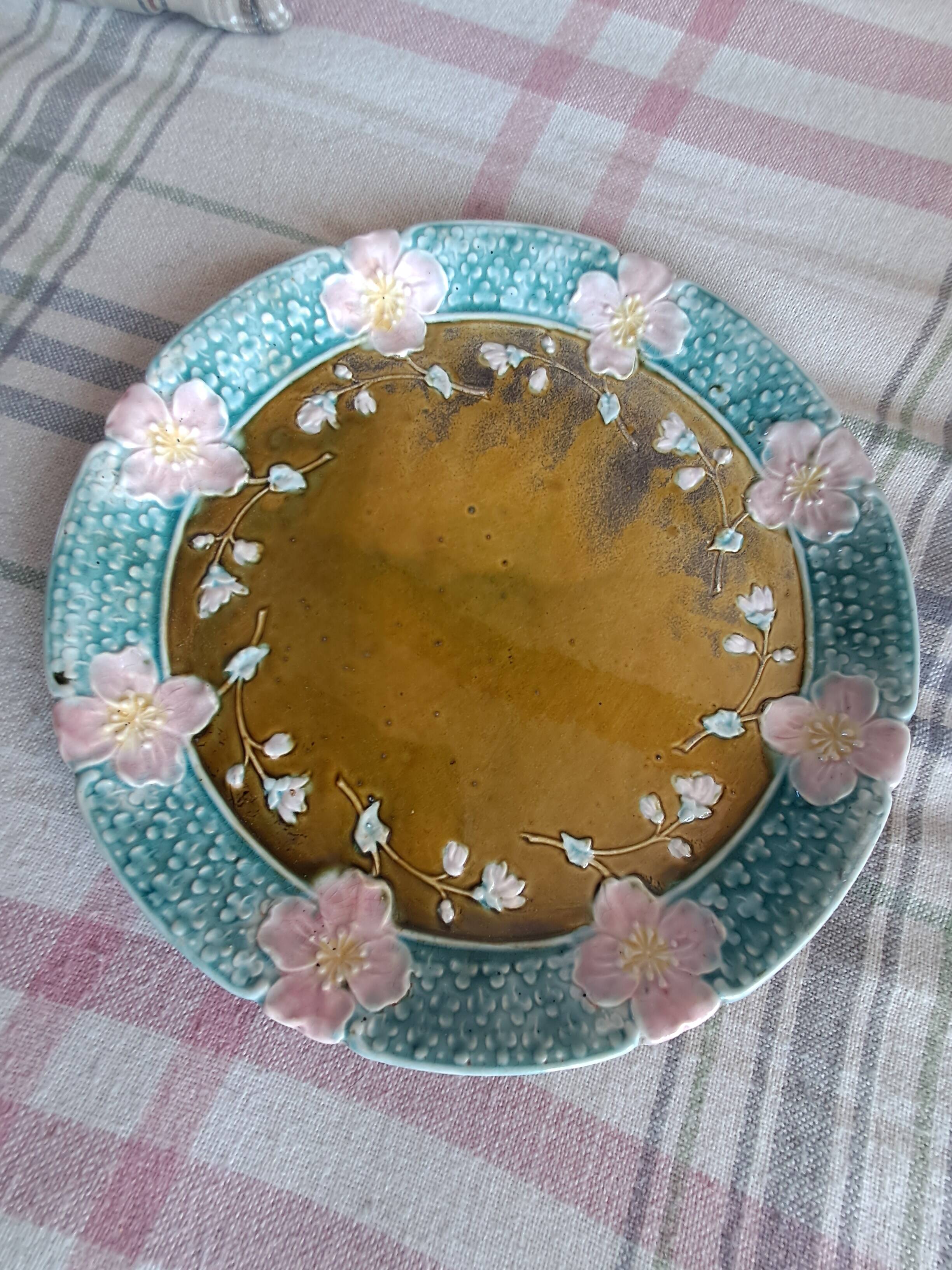 Vintage barbotine plate by Gustave de Bruyn.