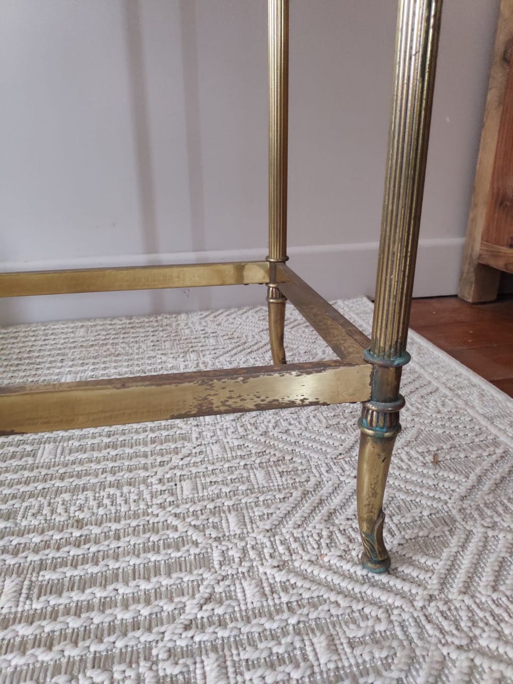 Glass and brass console table