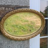 Bevelled oval antique mirror