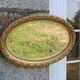 Miroir ancien ovale biseauté