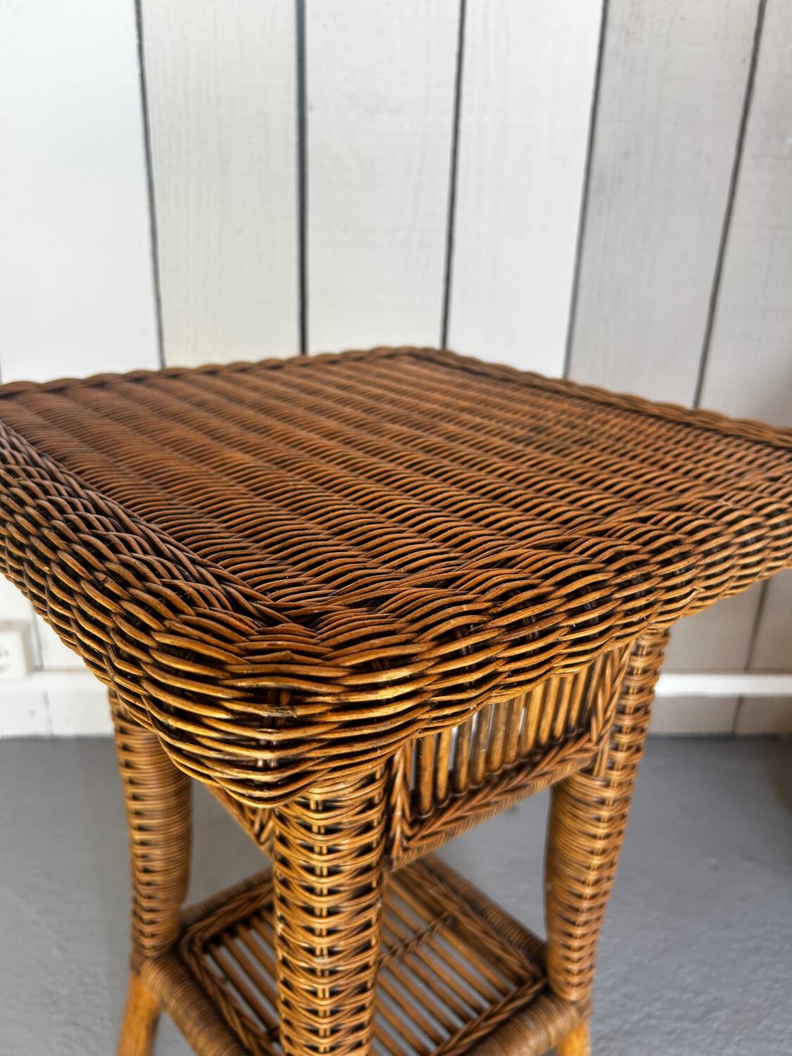 Vintage rattan armchair with side table