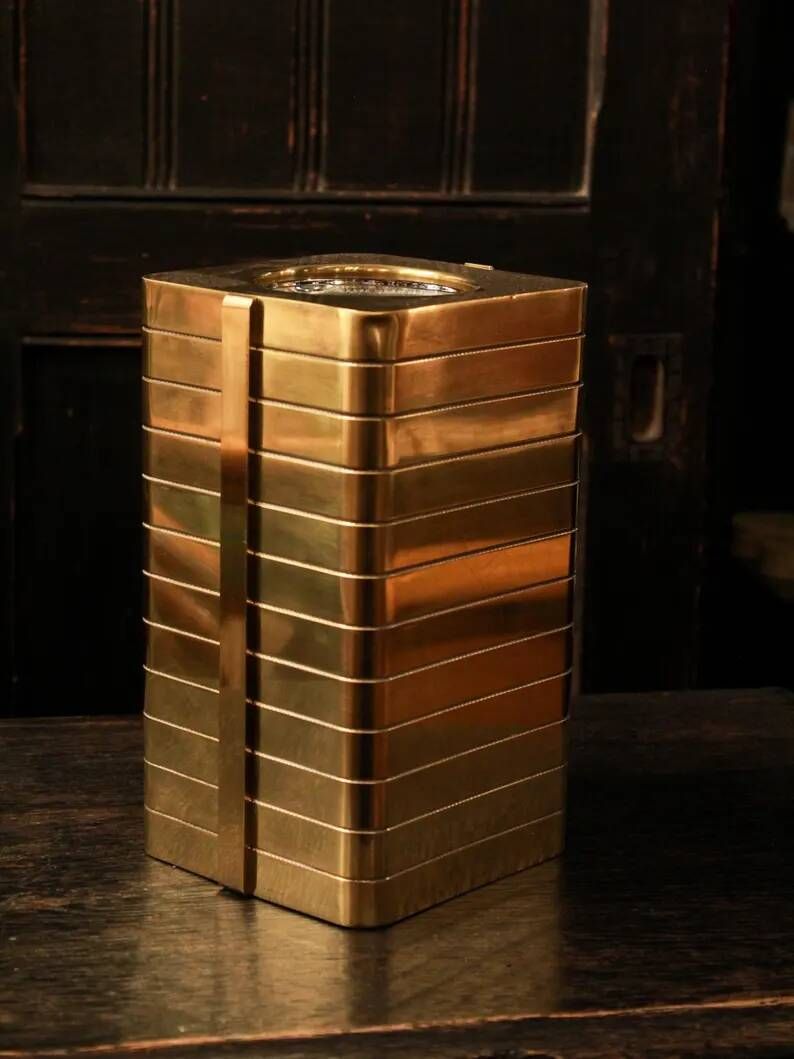 Italian gold-plated bottle cooler, architectural ribbed design.