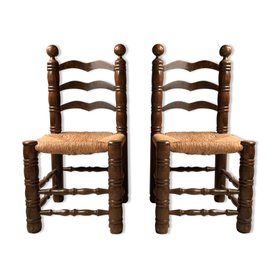 Paire de chaises en bois massif et assise paillée