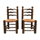 Pair of solid wooden chairs and mulched seat