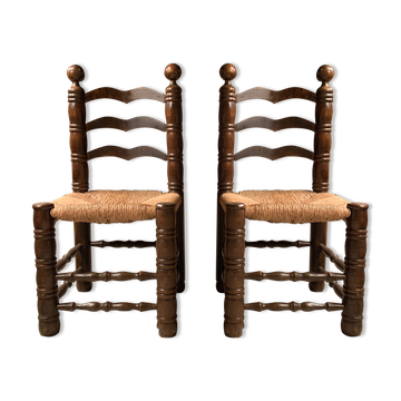 Paire de chaises en bois massif et assise paillée
