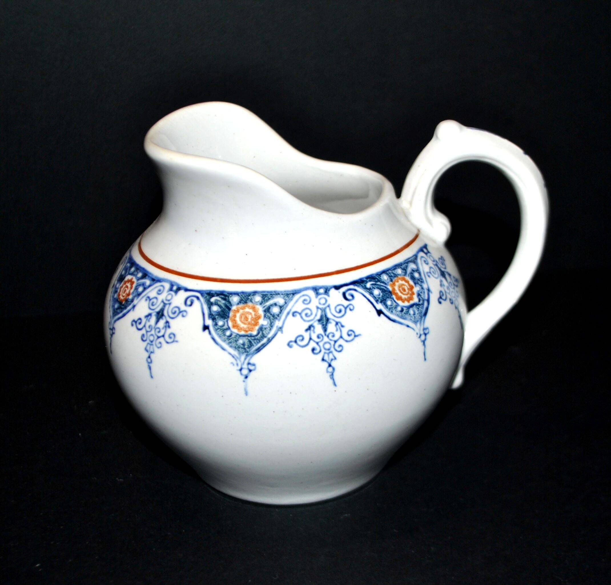 Saint Amand earthenware pitcher with stencil decoration