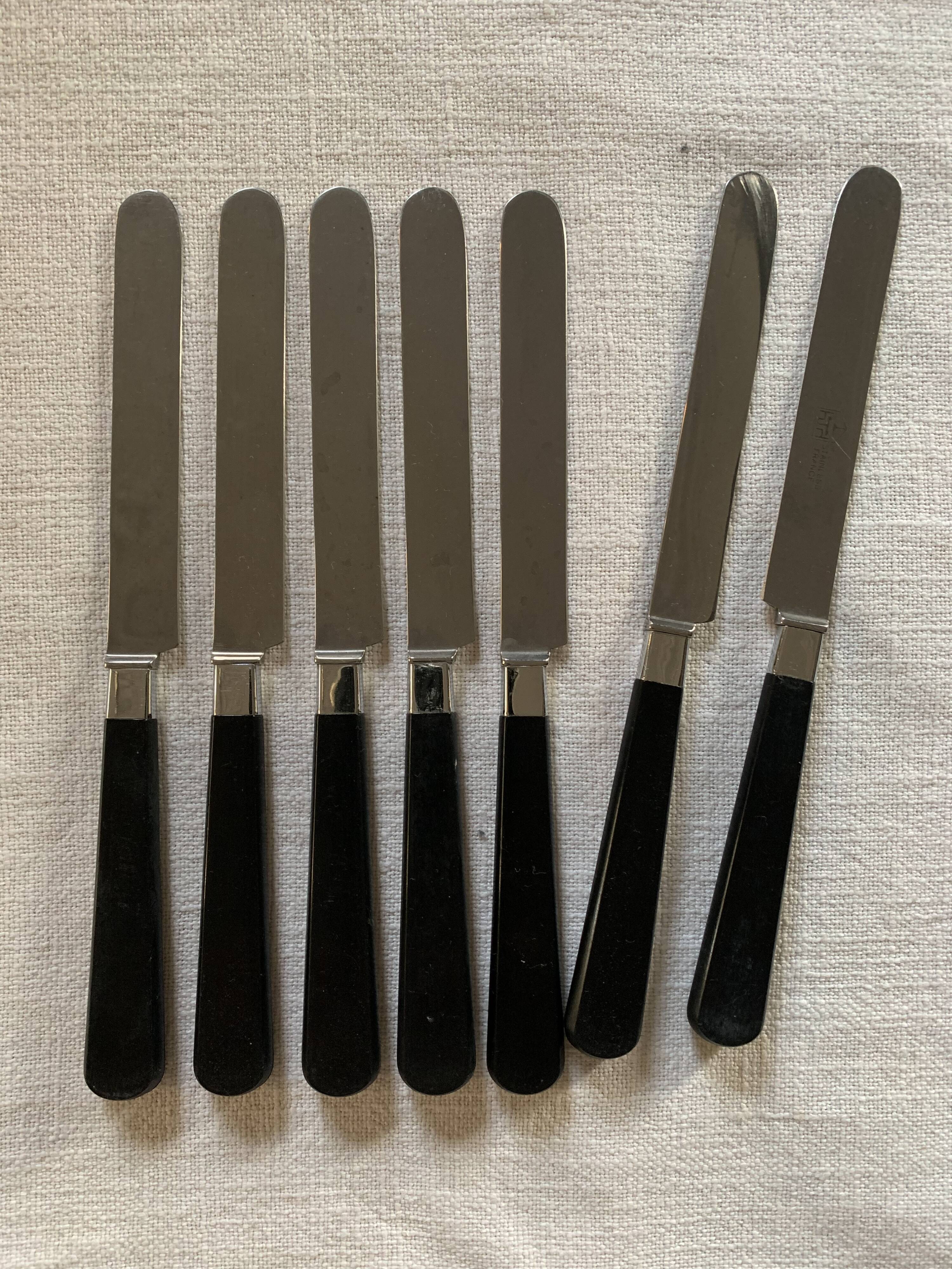Batch of black cheese knives