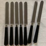 Batch of black cheese knives