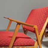 Pair of armchairs in mottled red and wood by Uluv, former Czechoslovakia 1960