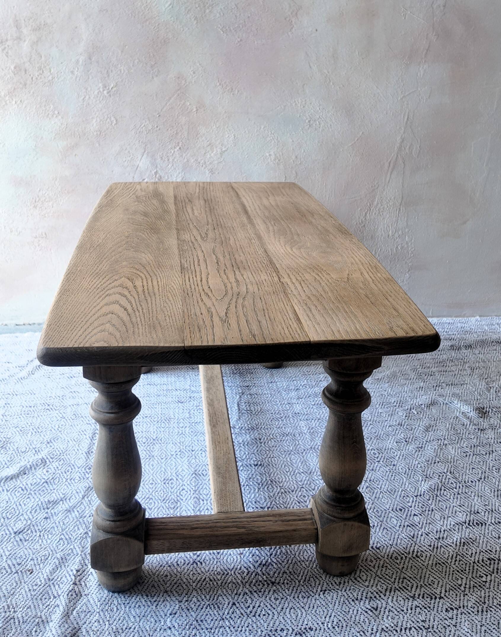 Old farmhouse coffee table in solid oak - turned legs and stretcher.