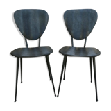 Pair of chairs with tapered metal legs and black Skaï, 60s