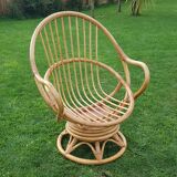Pair of swivel rattan armchairs