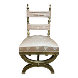 Chaise curule dorée
