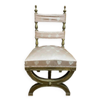 Chaise curule dorée