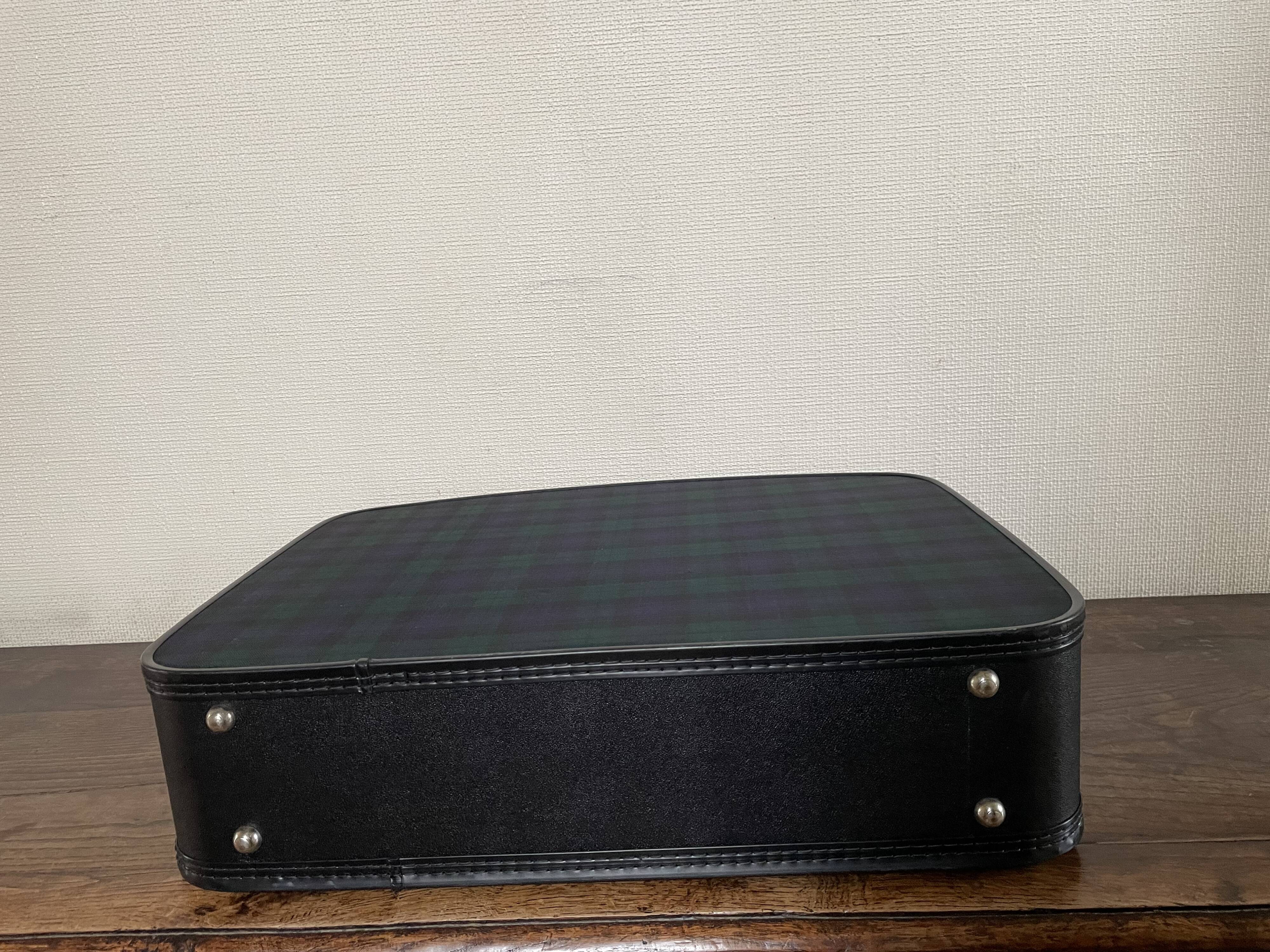 Tartan check suitcase