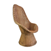 High-backed chair or shepherdess in vintage wicker