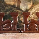 Pair of Art Deco carved wood candlesticks, signed Delaporte