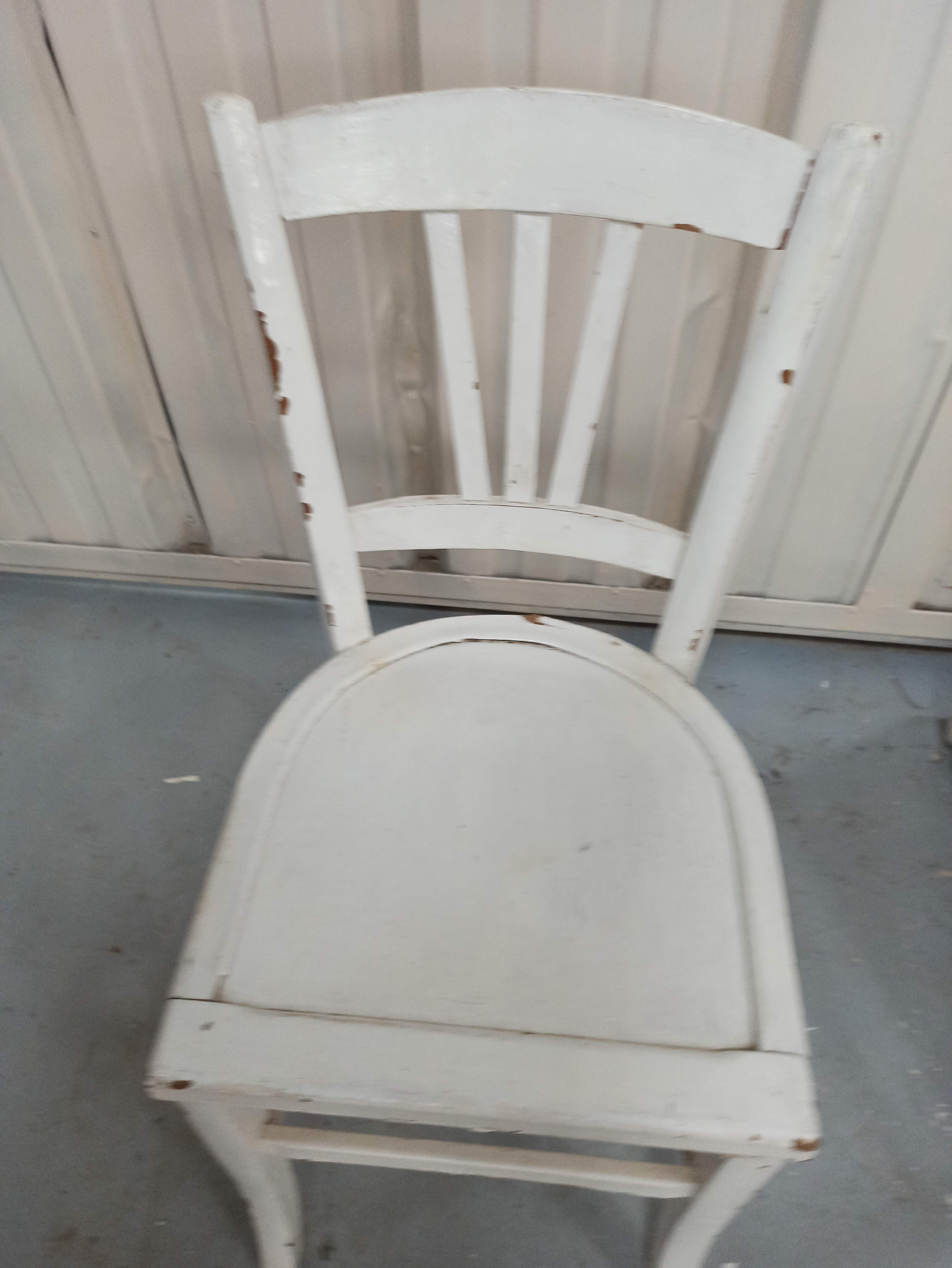 4 patinated white bistro chairs