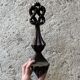 Carved wooden wall candle holder