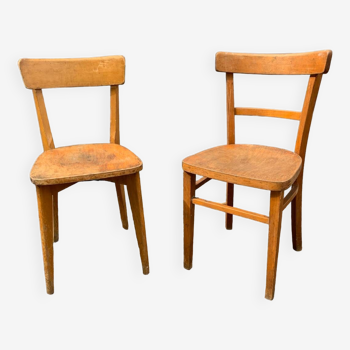 Set of 2 mismatched vintage bistro chairs