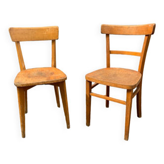 Set of 2 mismatched vintage bistro chairs