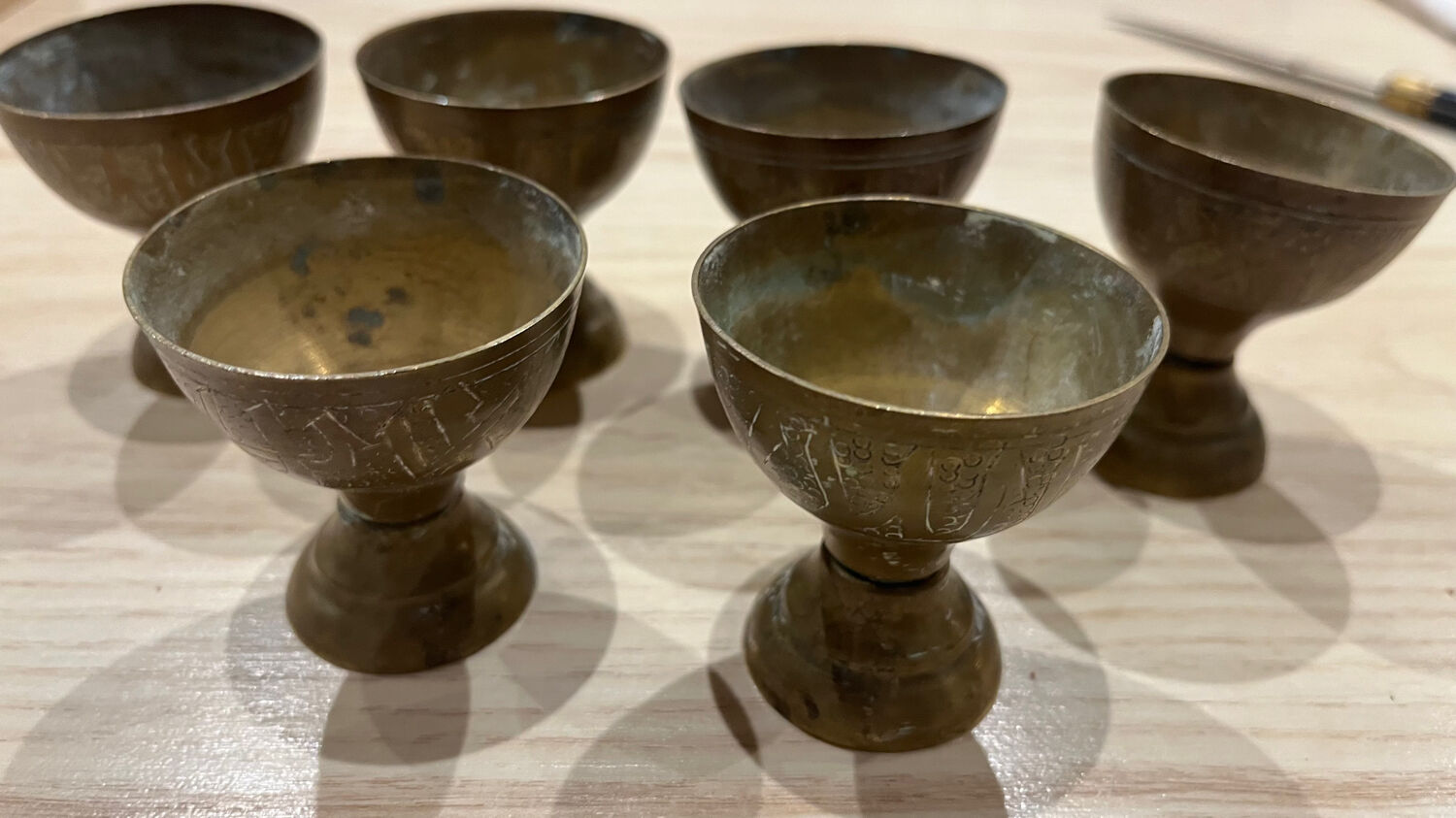 Brass egg cups