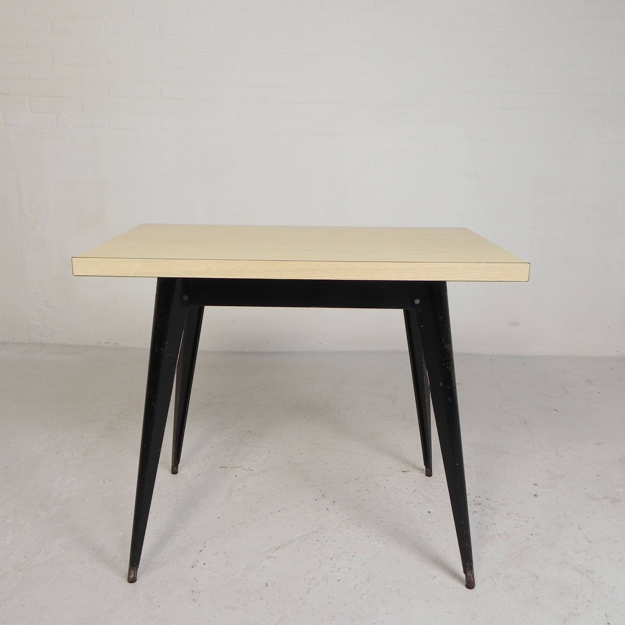 Bistro table Henri Julien, model Tolix T55 with a Formica top, 1950s.